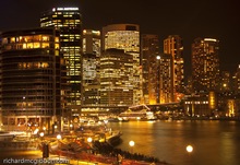 The city lights illuminates Sydney's Circular Quay