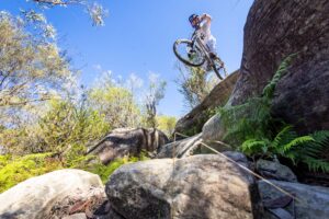 Mountain biker riding at Oxford Falls, Sydney – 210124_5006